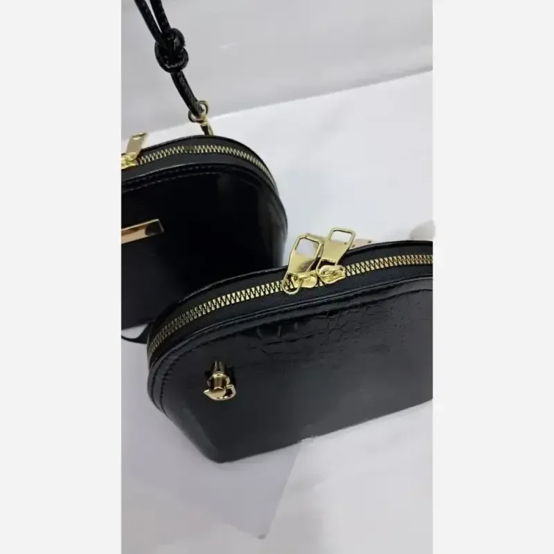 کیف دخترانه چرم ورنی مدل هایا سایز 20 در 12 با بند دوشی
