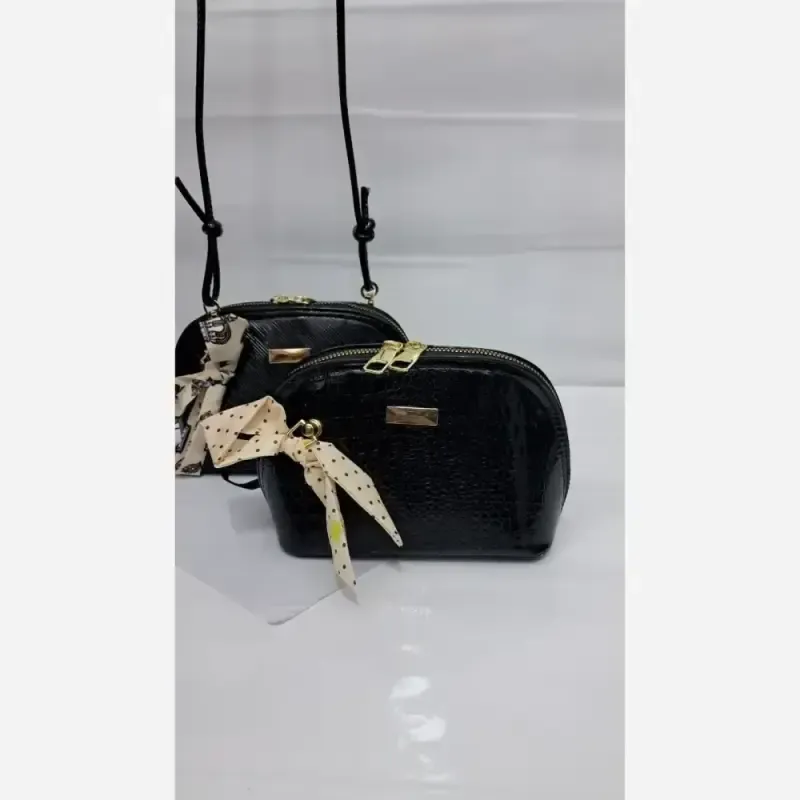 کیف دخترانه چرم ورنی هایا سایز 20 در 12 بند دوشی بلند