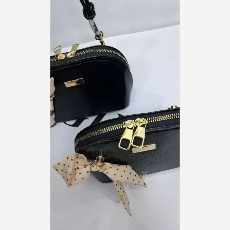 کیف دخترانه چرم ورنی هایا سایز 20 در 12 بند دوشی بلند