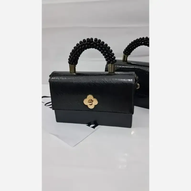 کیف دستی زنانه مدل ستایش چرم ورنی دسته مرواریدی