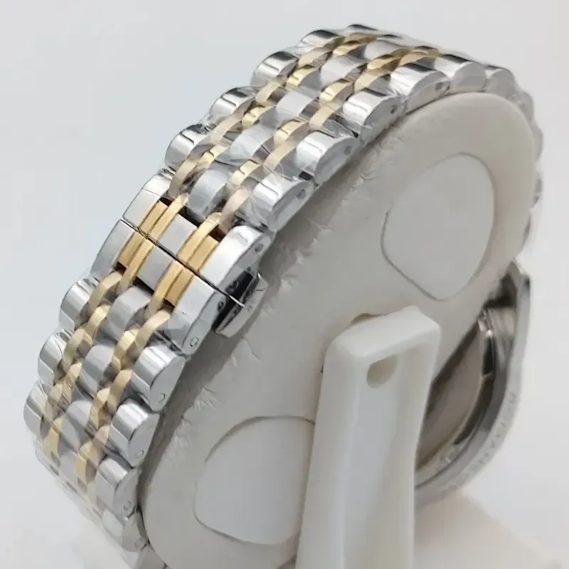 ساعت مچی مردانه رومانسون استیل طلایی صفحه طوسی موتور ژاپن کرنوگراف تقویمدار