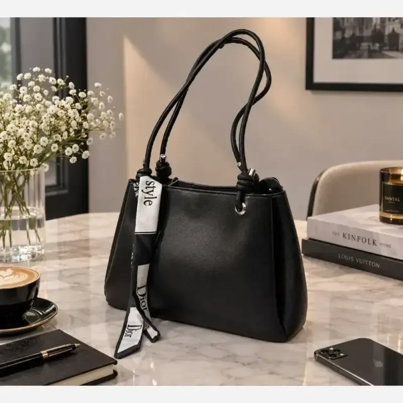 کیف دسته قیطونی چرم شرانگ مشکی سایز 28 در 22 زنانه